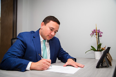 Brian M. Heit signing contract